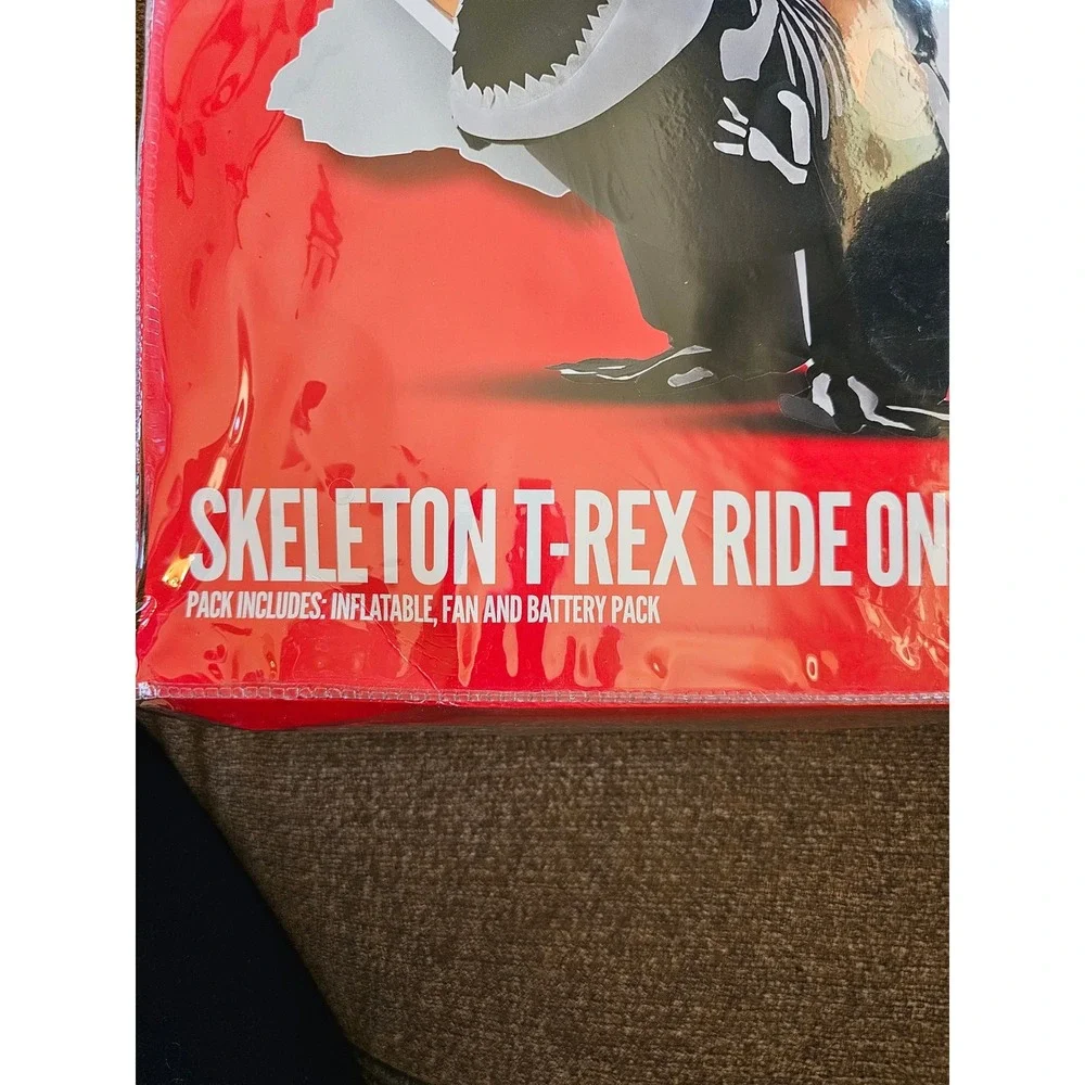 MorphCostumes Skeleton T‎ Rex Ride On Inflatable Child Costume Fan Battery Pack